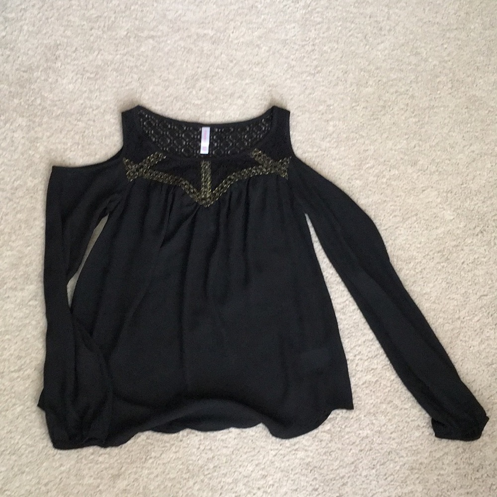 *Wifes closet. Black and gold stitched top; S.